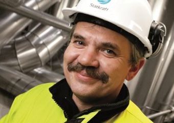 Man smiling. (Photo: Erik Thallaug)